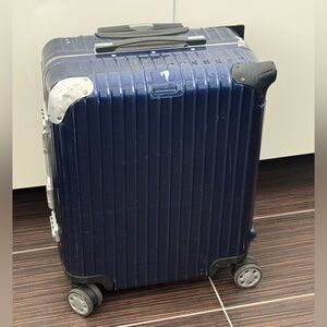 Rimowa Navy Hard Shell Spinner Carry-On Luggage